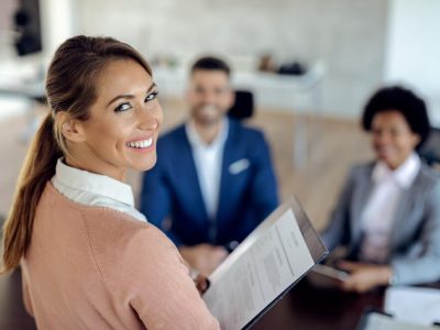 young-happy-woman-having-job-interview-office HR training employees